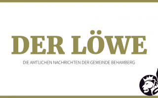 Wappen der Gemeinde. Ein goldener Löwe mit Geweih auf einem grünen Grund, umgeben von einem goldenen Kranz.